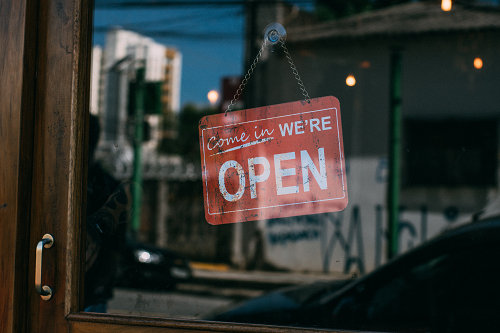 a close up of a open sign